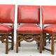 6 red leather chairs