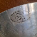 Large round hollow metal dish