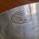 Large round hollow metal dish
