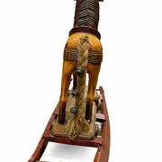Ancient wooden rocking horse with original paint, hand-carved.