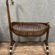 Empire style mahogany cradle with a swan neck, shaped like a cradle, circa 1810