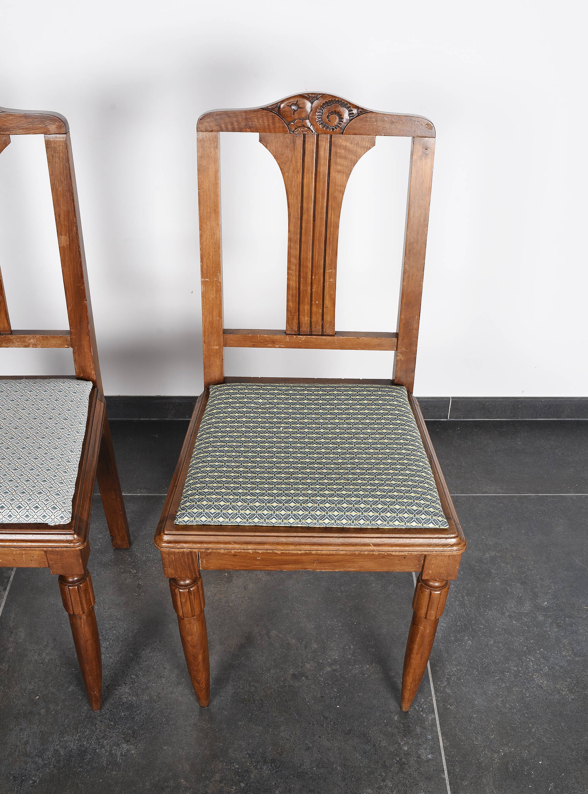 Set of 4 Art Deco chairs in carved wood.