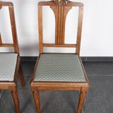 Set of 4 Art Deco chairs in carved wood.