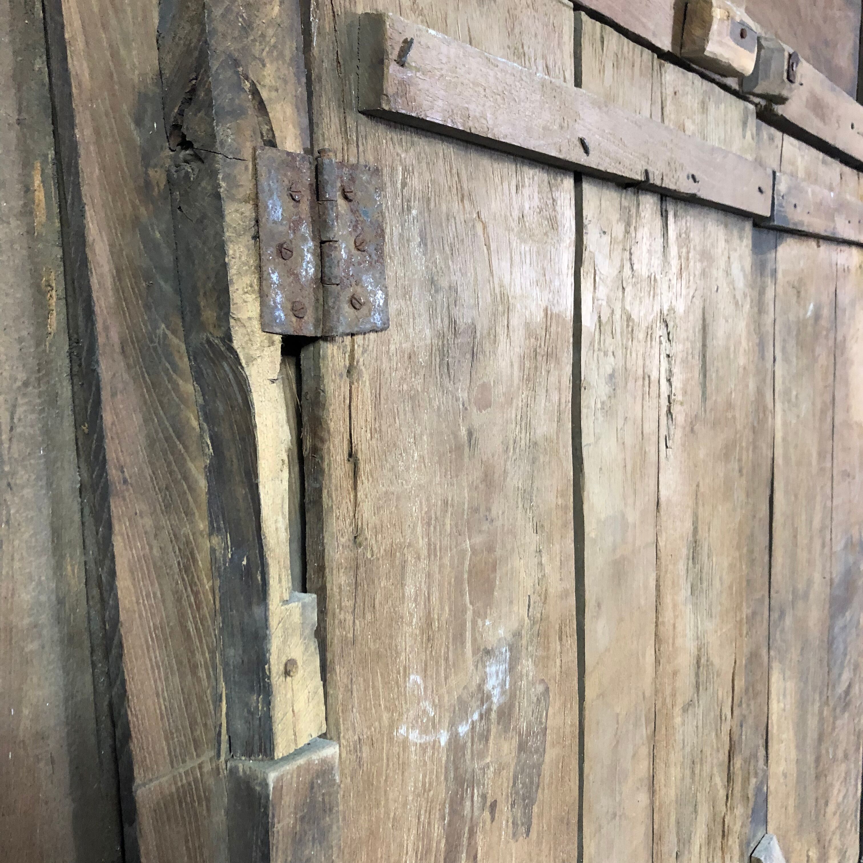 Old wooden door with its frame
