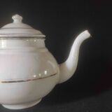 White enamelled sheet metal teapot