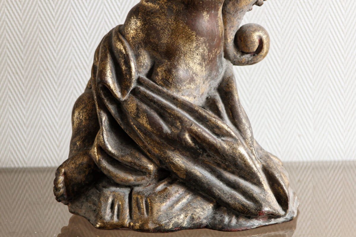 Ancient plaster cherub