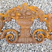 Cast iron pediment with birds