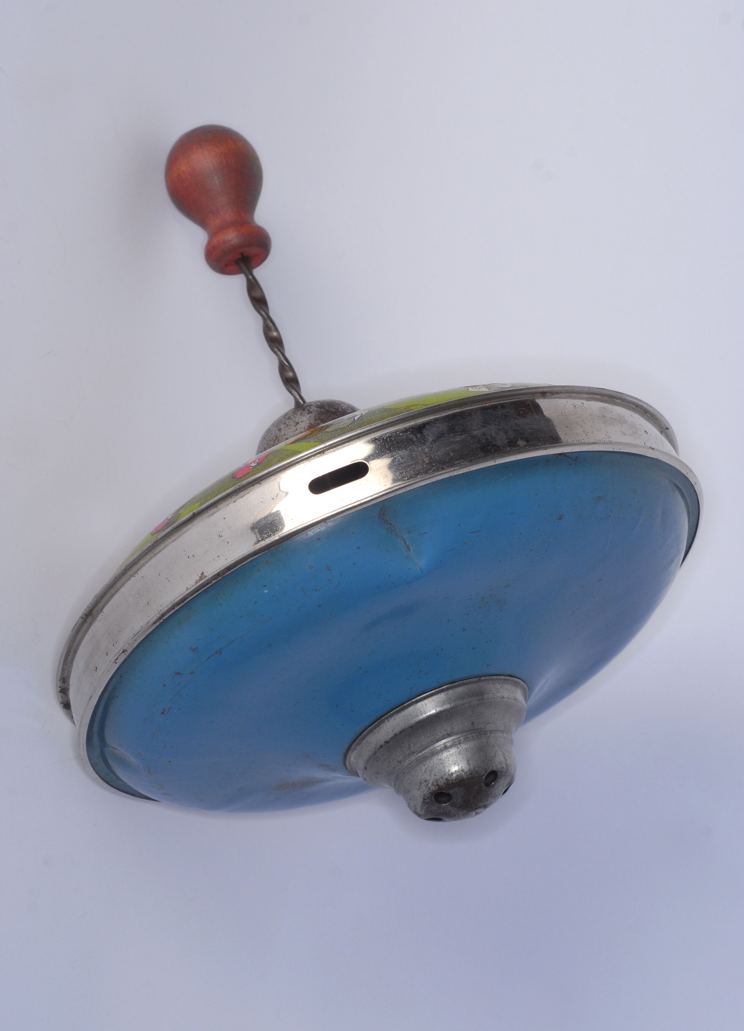 Old lithographed spinning top dating from the 1930