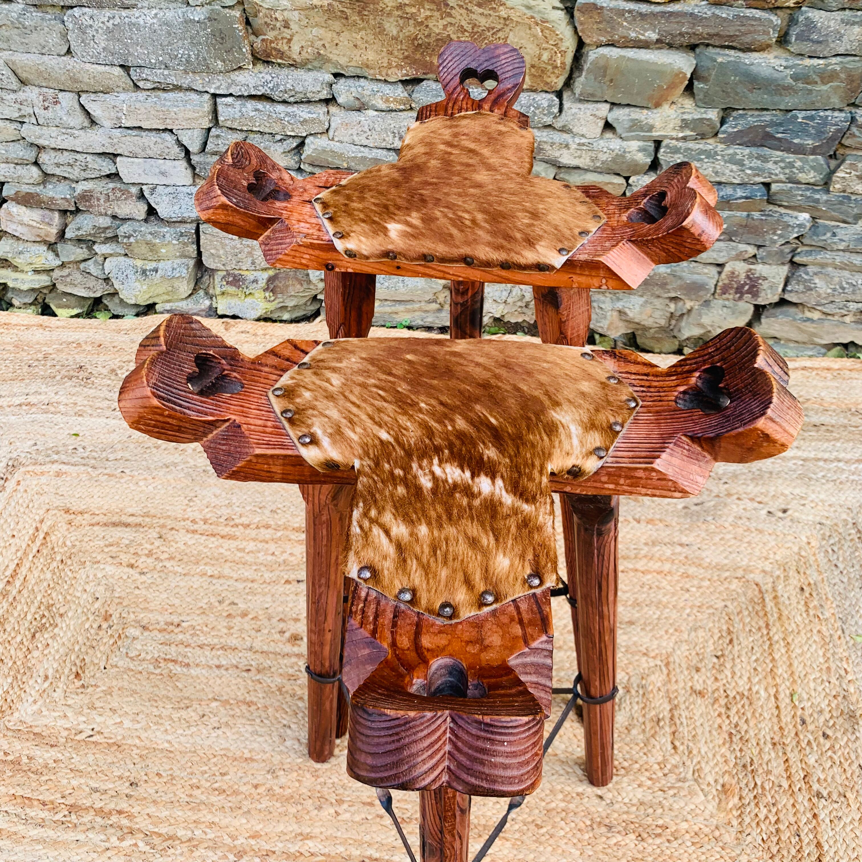 Set of 2 vintage high stools in cowhide and wood