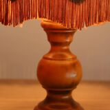 Table lamp in turned wood and umbrella-style leather lampshade