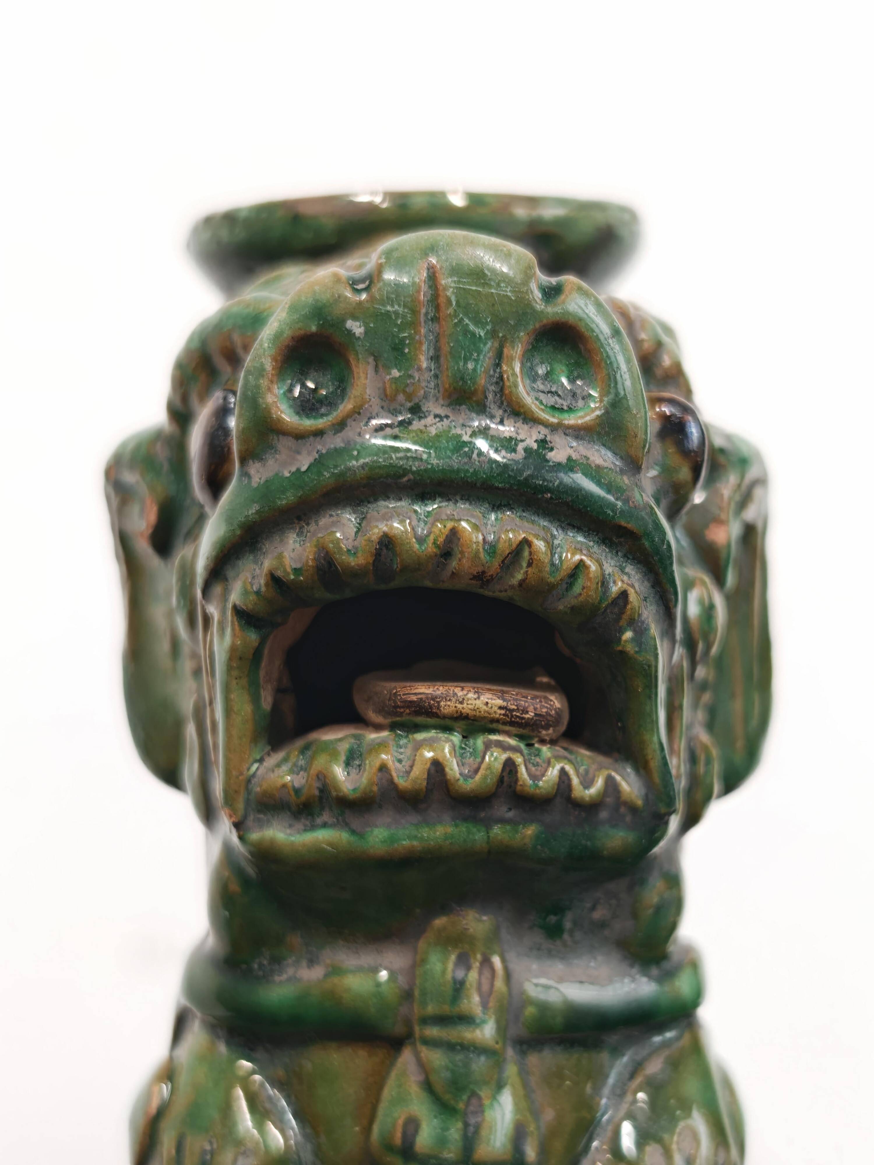 Pair of Foo Dog candle holders in ceramic, China 19th century