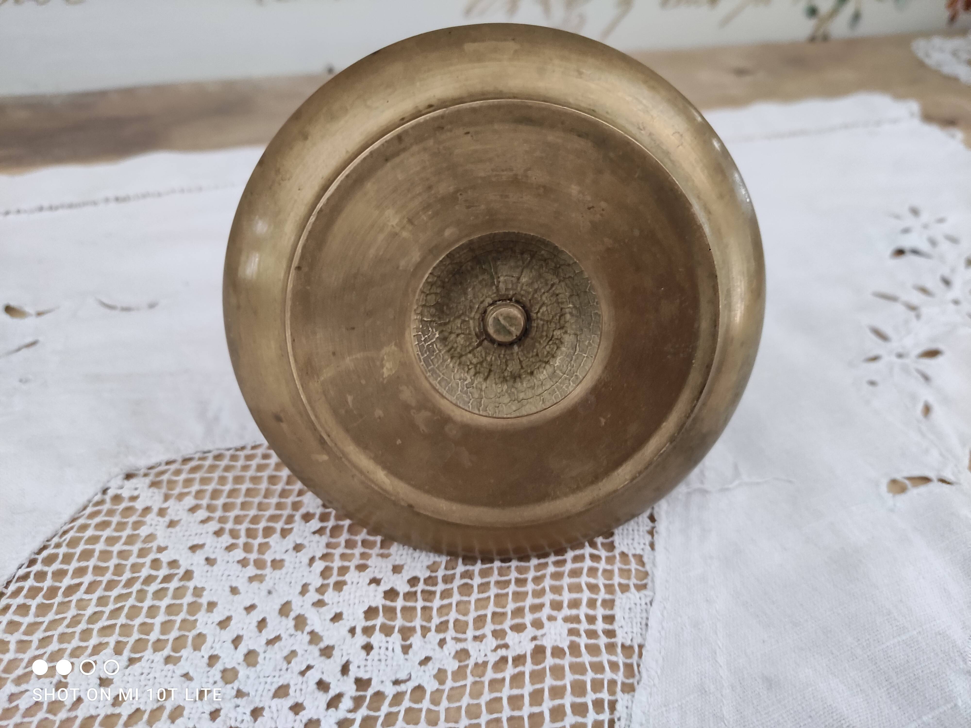 Hand candle holder called cellar rat in solid brass