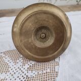 Hand candle holder called cellar rat in solid brass