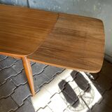 Extendable teak dining table