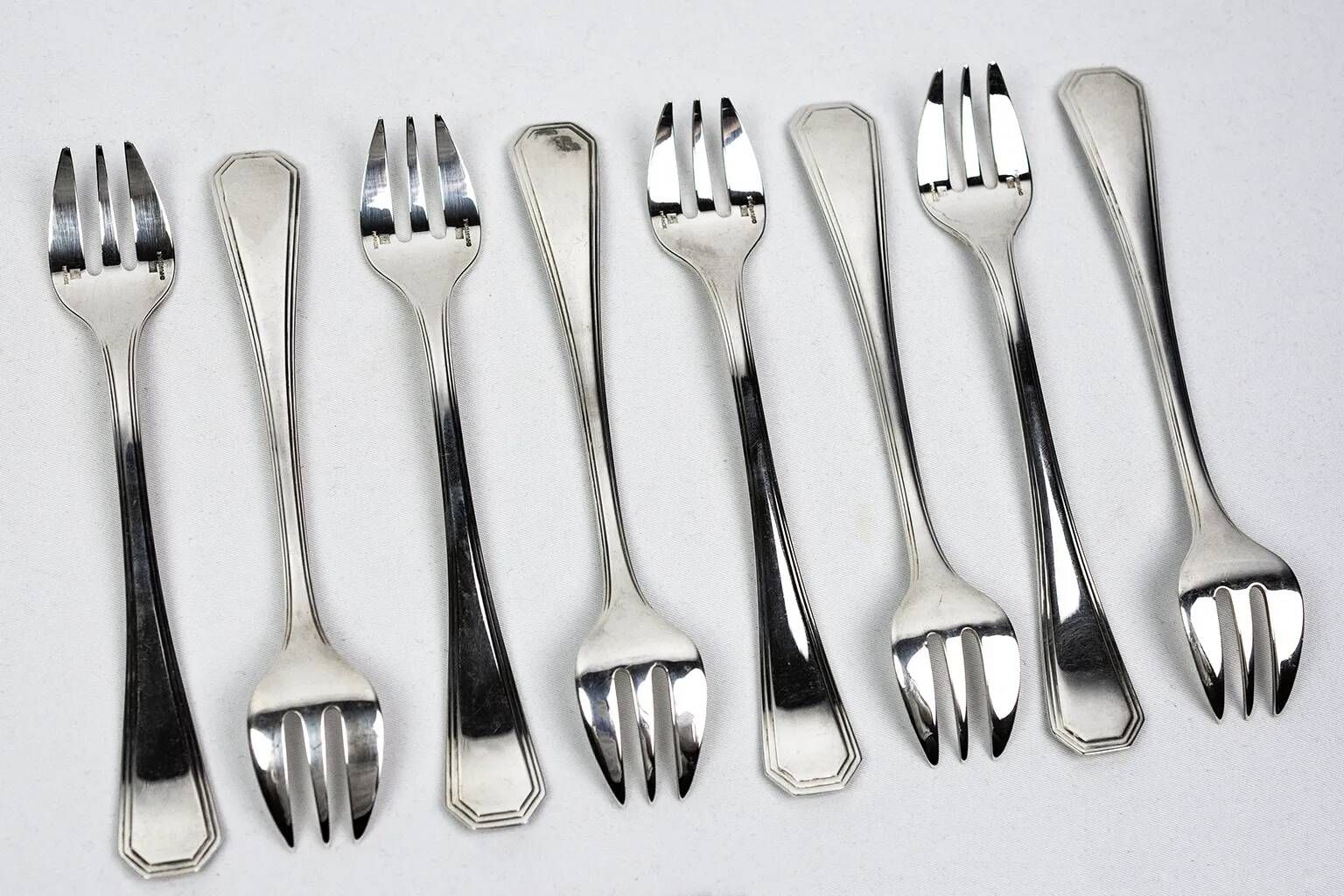 8 Christofle America silver-plated oyster forks, Luc Lanel