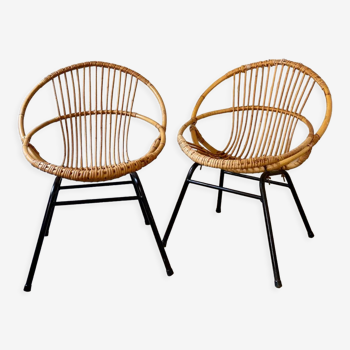 Two rattan armchairs