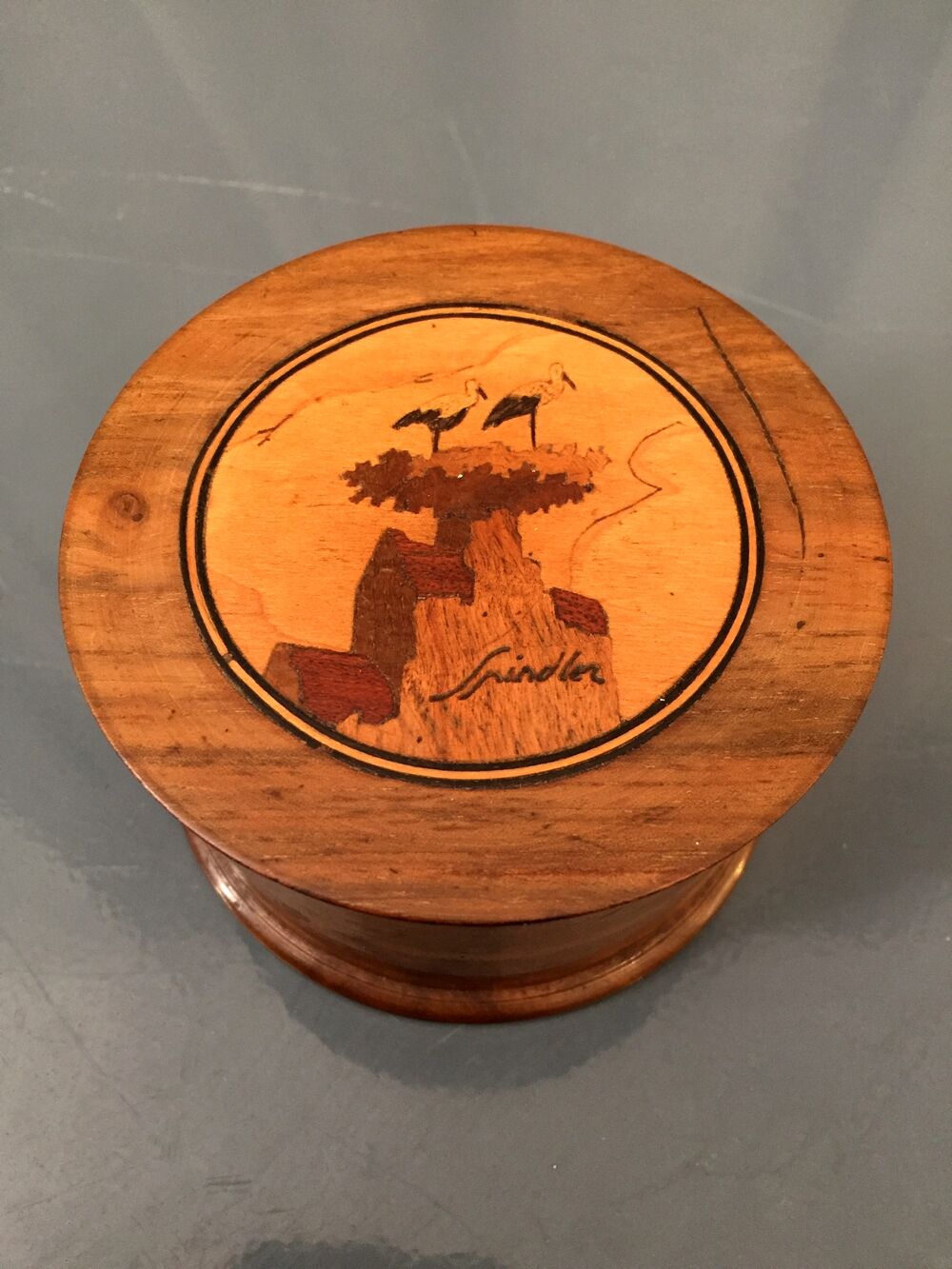 Decorative walnut box and spindler marquetry stork's nest