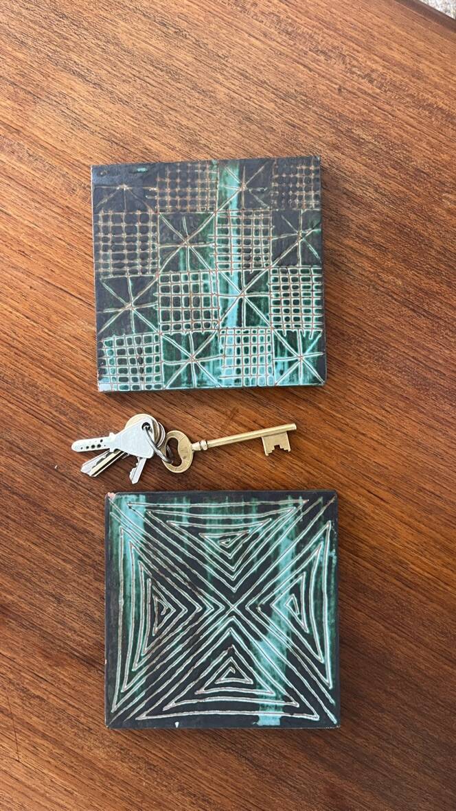 Pair of Robert Picault ceramic trivets with geometric patterns