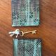 Pair of Robert Picault ceramic trivets with geometric patterns