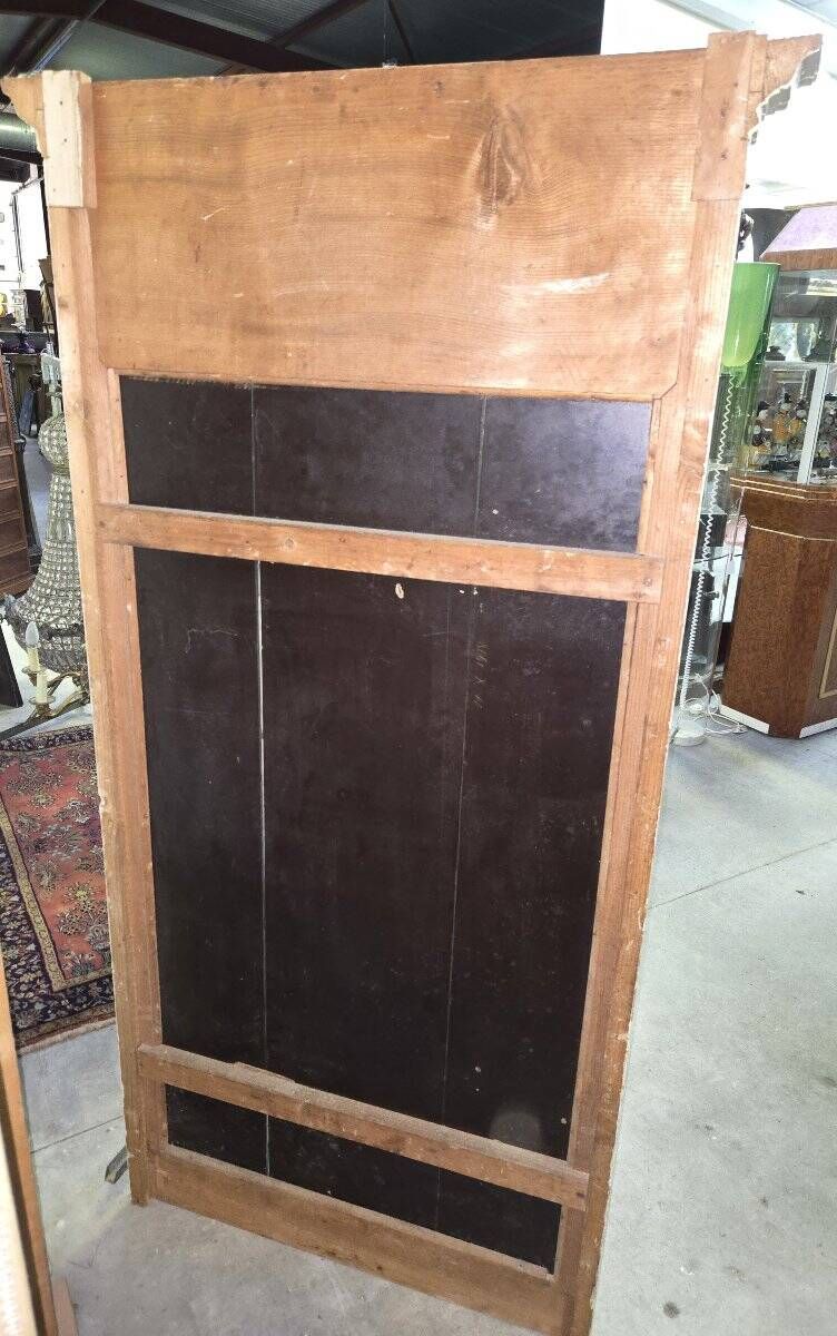 Louis XVI style trumeau mirror with a painted wooden frame.