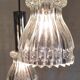 Suspension cascade 3 lights in chrome metal and crystal - mid 20th century.
