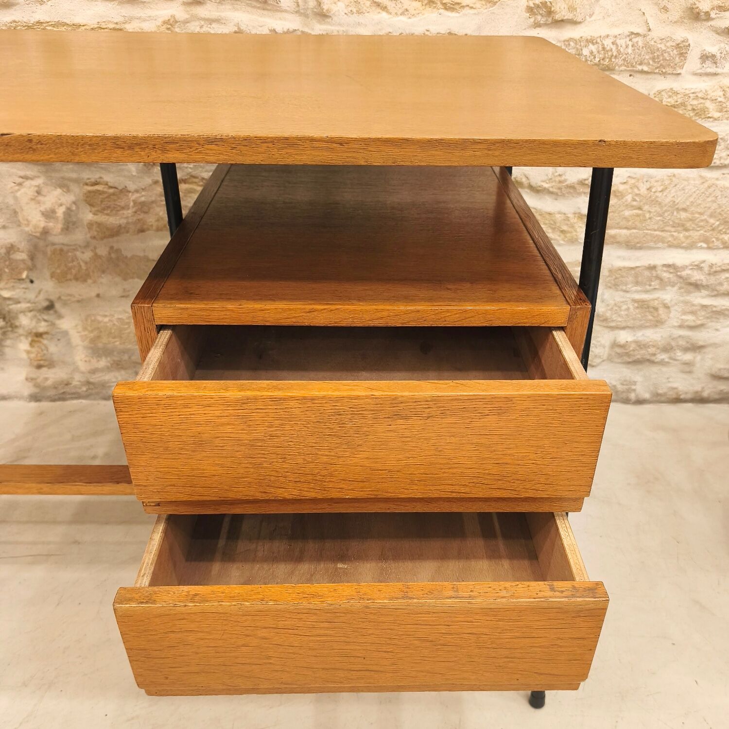 Modernist desk with suspended drawer unit, French work from the 1950s.