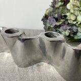Brushed aluminum candle holder