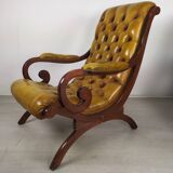 Pair of padded Chesterfield armchairs