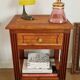 Low cherry wood furniture in Directoire style.
