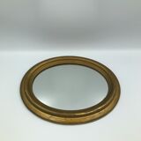 Vintage old bevelled oval mirror