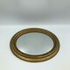 Vintage old bevelled oval mirror