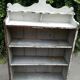 Old white shelf in weathered pine