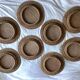 Set of round woven rattan and canework coasters