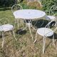 Table ronde de jardin et ses 4 chaises en métal