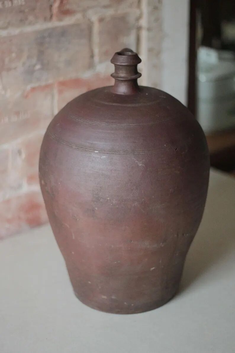 Old handled pot, antique pot, handled jar, interior decoration, collection, pottery.