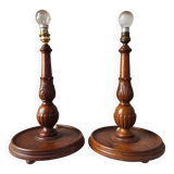 Pair of antique carved wooden lamps