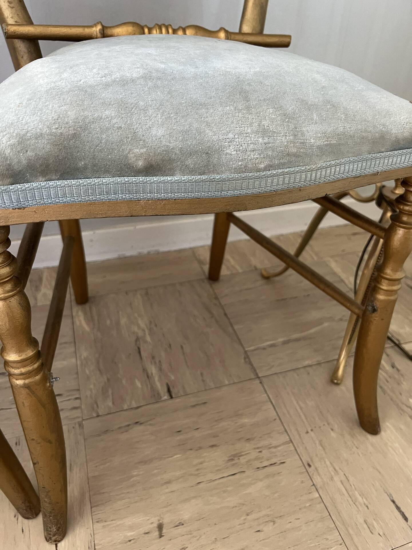 Pair of Napoleon III chairs in gilded wood with velvet upholstery.