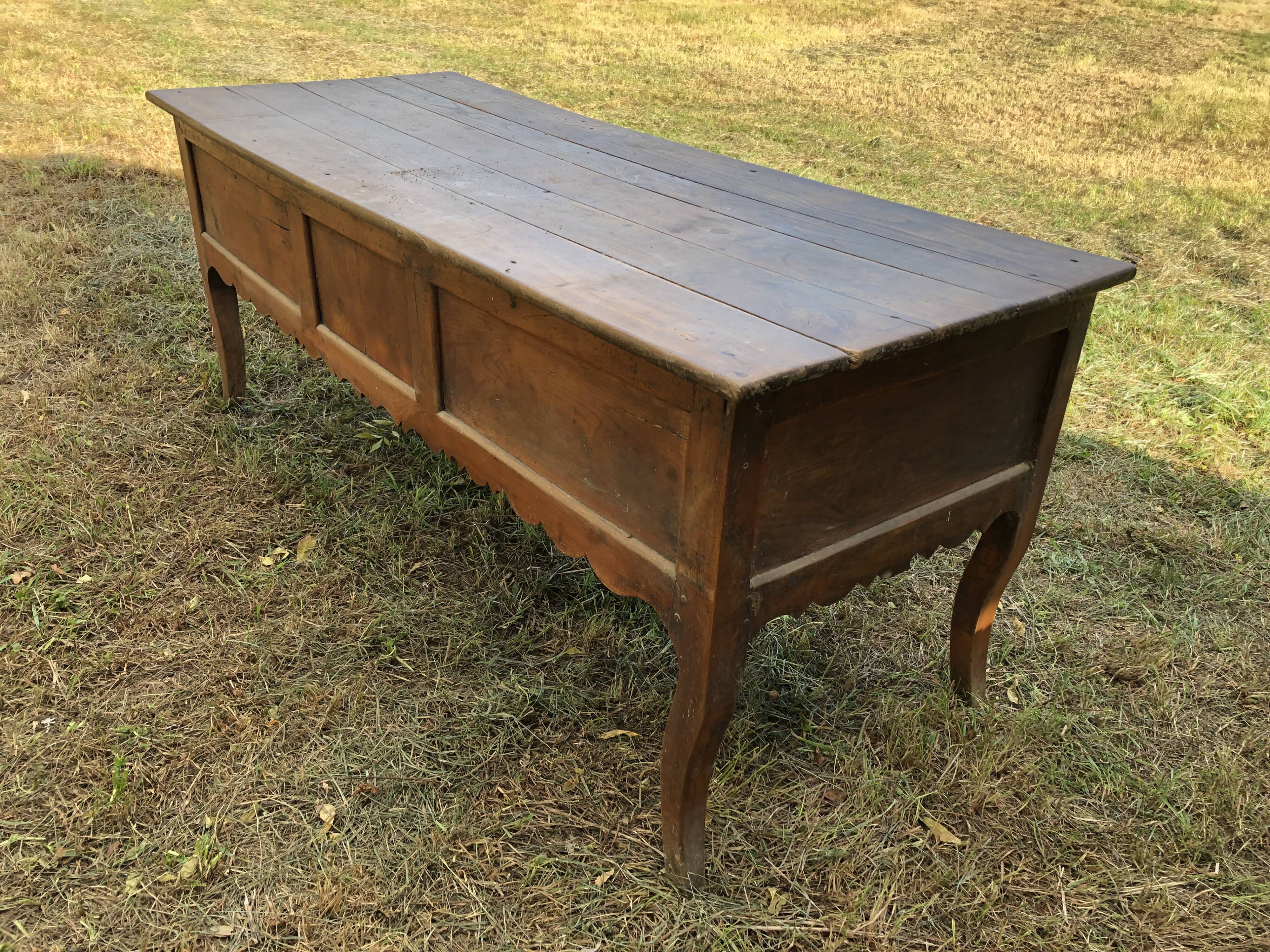 Antique Louis XV paneled table with 3 front drawers in solid cherry wood