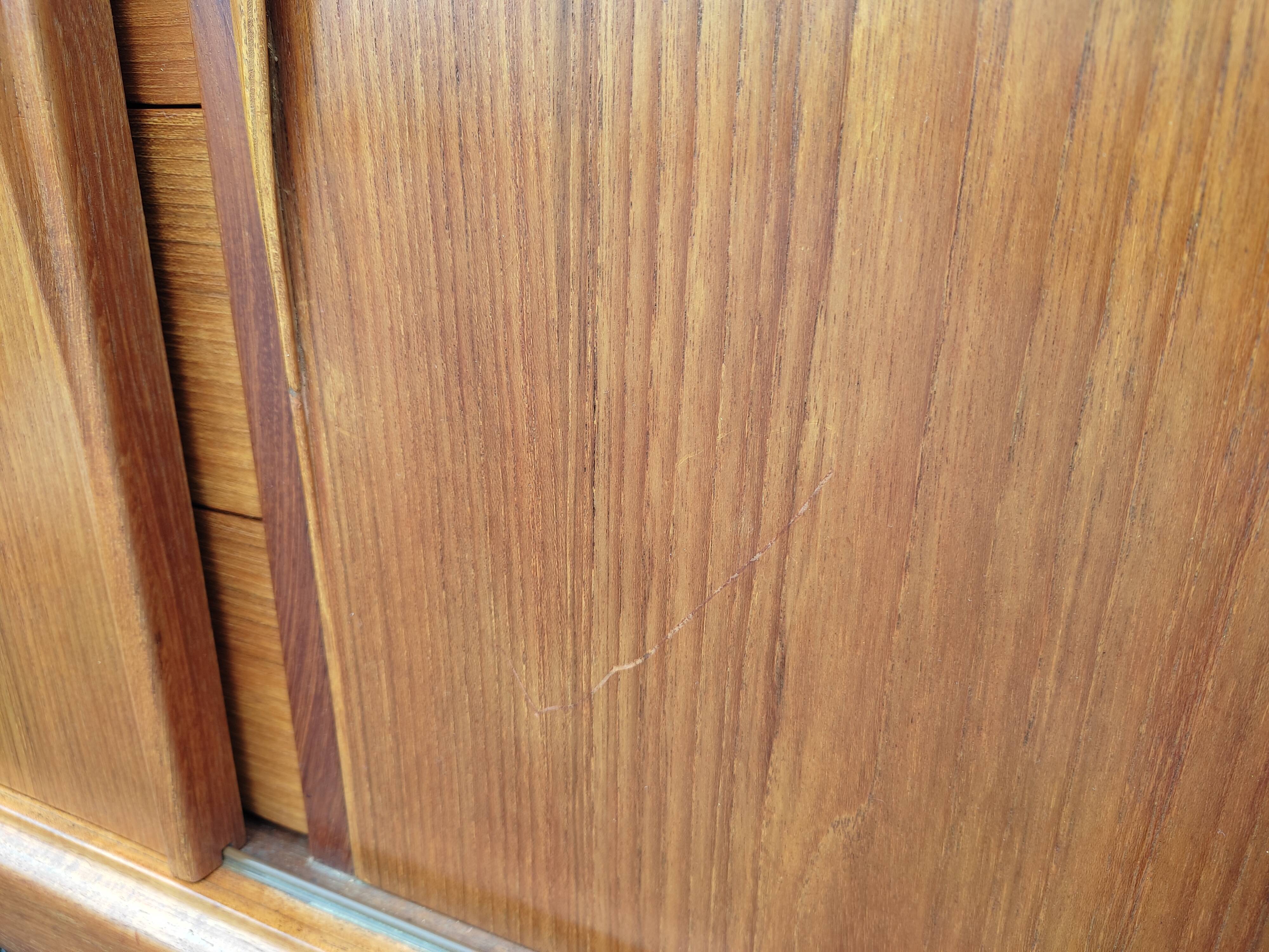 Scandinavian teak row by Axel Christensen for ACO Mobler