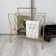 Vintage gold metal magazine rack