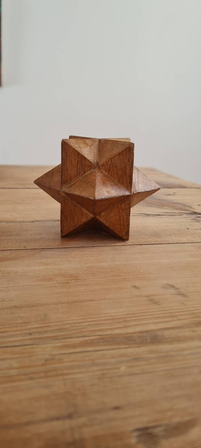 Sacndianve teak paperweight