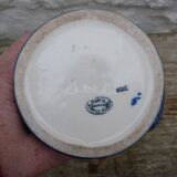 Blue ceramic vase with floral motifs