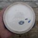 Blue ceramic vase with floral motifs