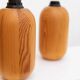 Pair of XXL Domus table lamps in marron wood with chrome globe bulbs