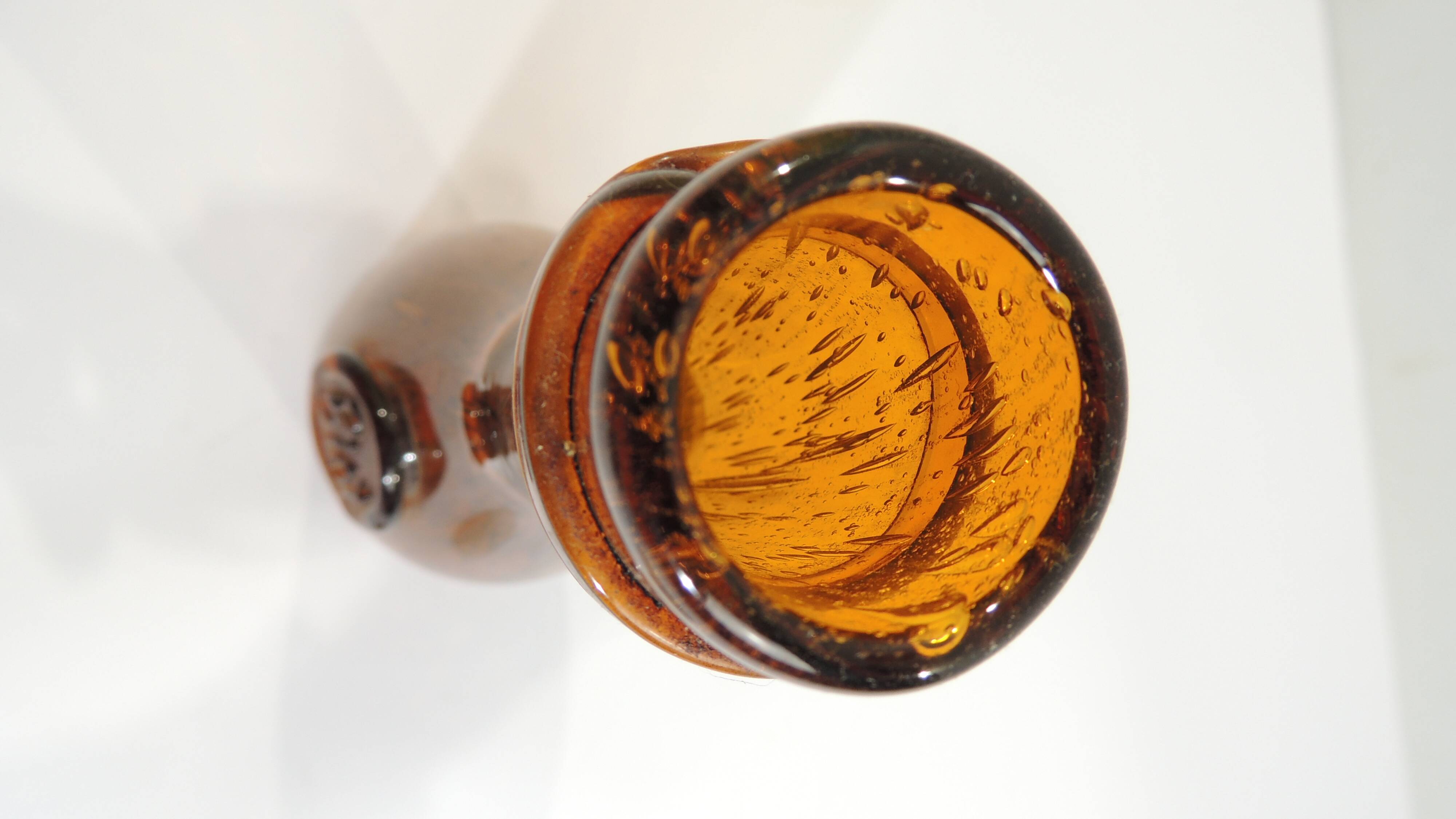 Amber bottle in bubbled blown glass, signed Biot – France, vintage 1970s