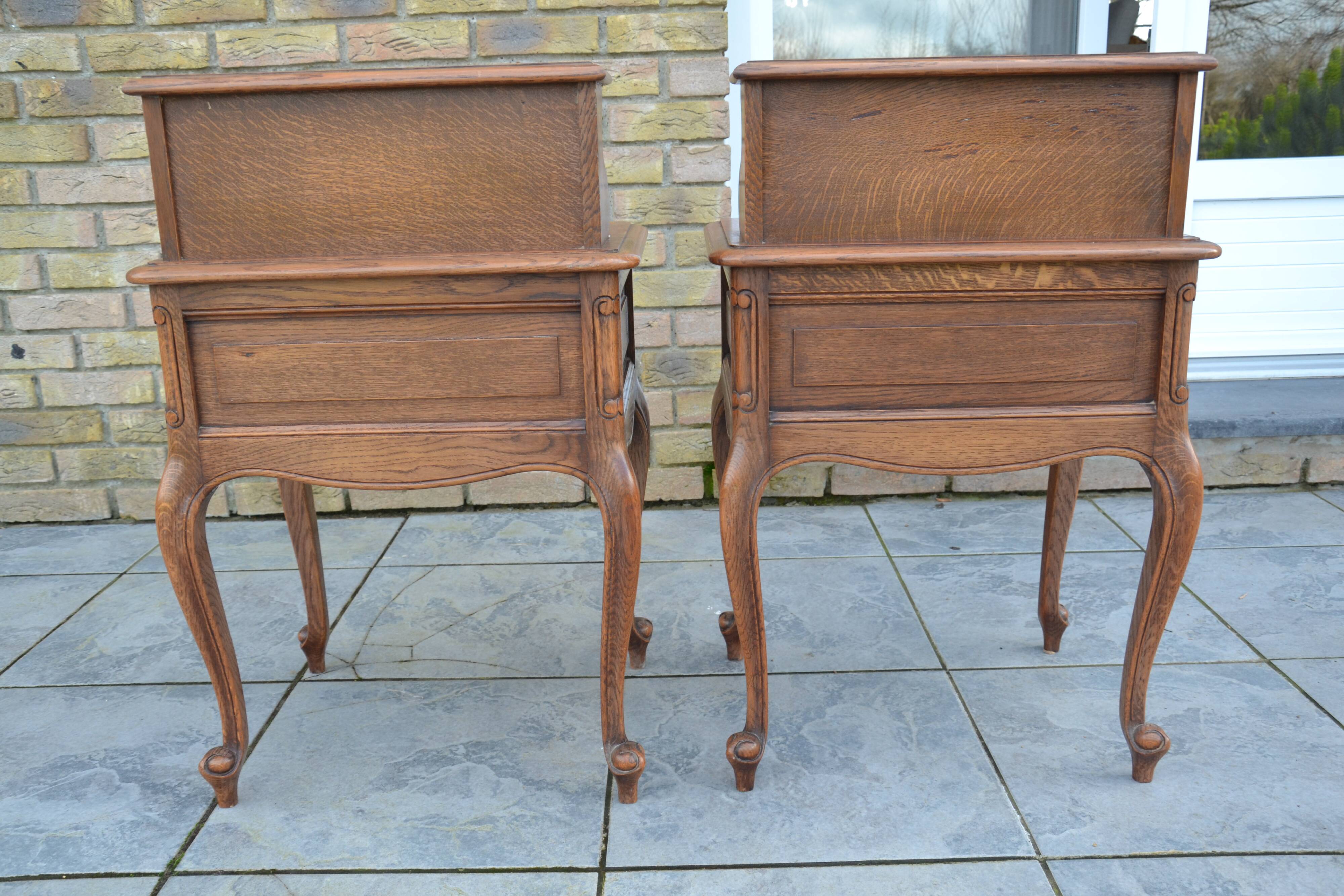 Two oak bedside tables.