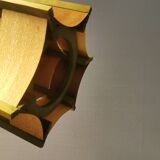 Older lamp in wood veneer, partially painted in green colour.