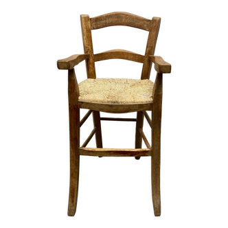 Wooden children's high chair and mulched seat