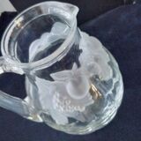 Large water jug with embossed fruit decoration in frosted glass