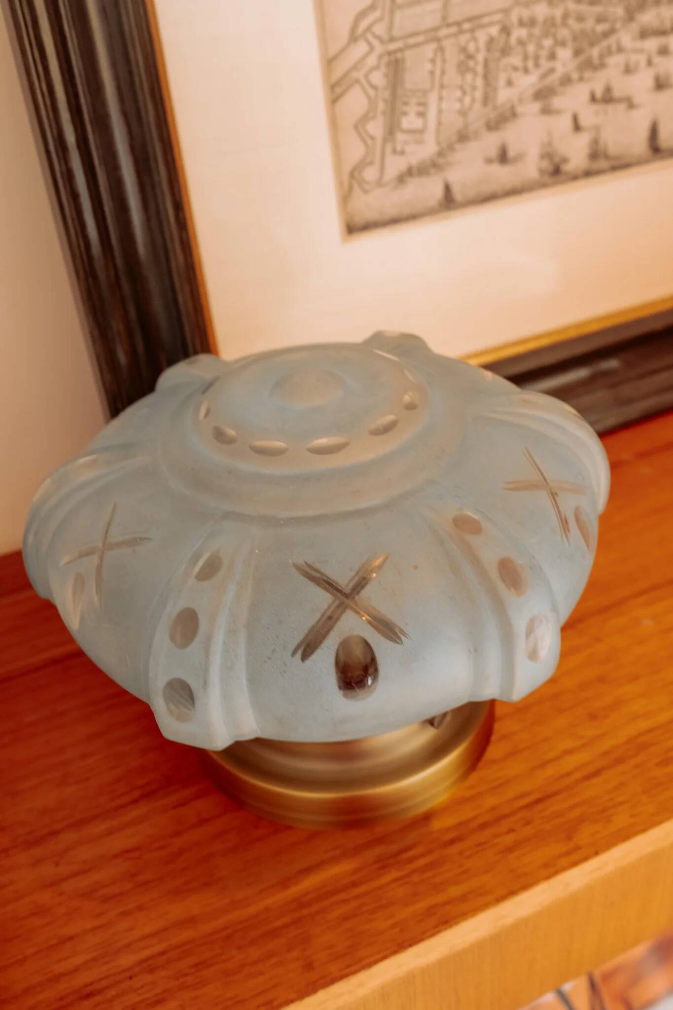 Vintage ceiling light in light blue glass with new frame.